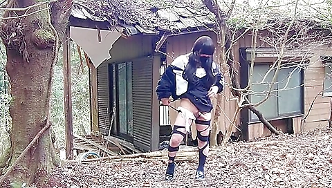 Japanese trans girl exfoliating in an abandoned forest