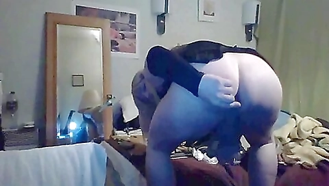 Transvestite fucks the blonde in her home with a dildo