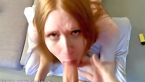 Redheaded shemale in tight pants and a dildo is fucked