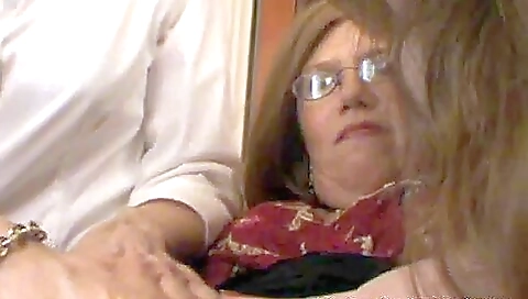 Busty milf is getting her cunt fingered by her stepson