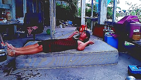 Asian girl enjoys outdoor solo sex with a fan on the beach